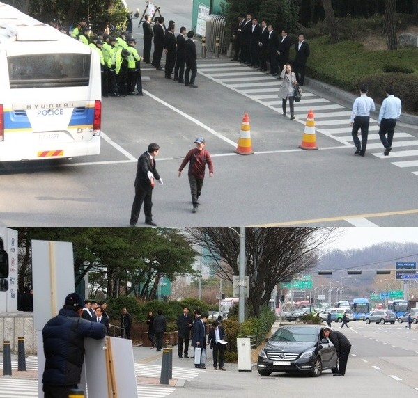 (위부터)출입구에서 대규모 집회가 있는 날이면 서초경찰서 경찰들이 출동해 하나로마트로 통하는 쪽문을 비롯해 사옥 전체를 에워싸고, 평소에 주출입구에서 보안요원들은 차량은 물론, 방문객의 신원을 확인하고 있다. 한 1인 시위자가 보안 요원들의 감시를 바라보고 있다. 정수남 기자 