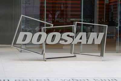 두산건설,  GE에 보일러사업부 매각