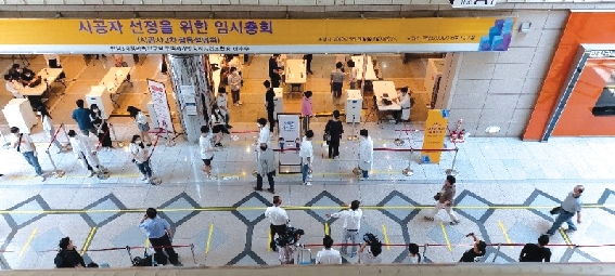 ▲ 지난 21일 코엑스에서 열린 한남3구역 시공사 선정 총회 현장. 사진 = 장호성 기자