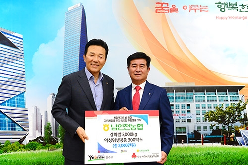 ▲ 남인천농협 조합장 이태선(오른쪽), 연수구청 구청장 이재호(왼쪽).