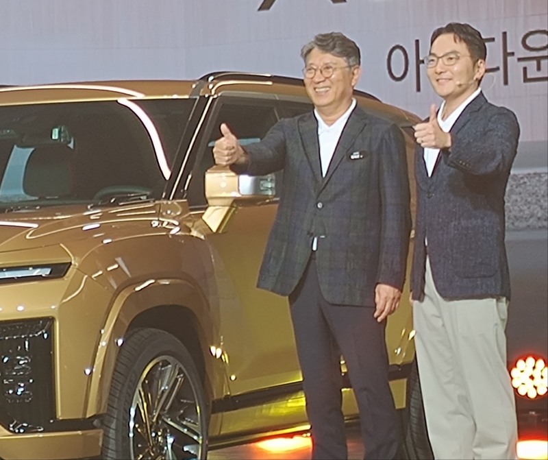 KGM 곽재선 회장(왼쪽)과 곽정현 사장.