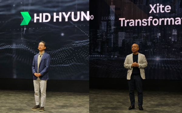 3일 경기도 고양시 킨텍스에서 열린 '2025 서울 모빌리티쇼'에 마련된 HD현대관에서 HD현대사이트솔루션 대표이사인 조영철 사장(왼쪽)과 이동욱 사장이 발표하고 있다. /사진=신혜주 기자