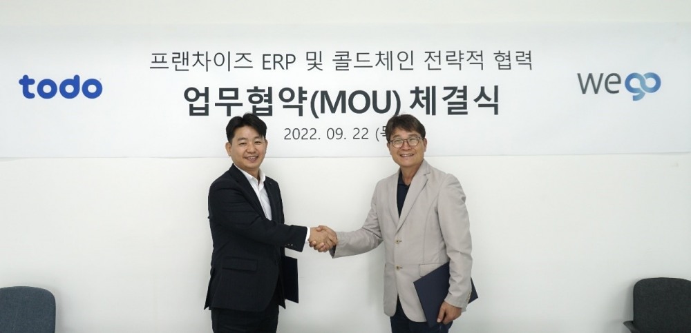(주)위고컴퍼니와 (주)투두가 22일 프랜차이즈 ERP 및 콜드체인 비즈니스를 위한 전략적 업무협약을 맺었다. (사진제공=위고컴퍼니)