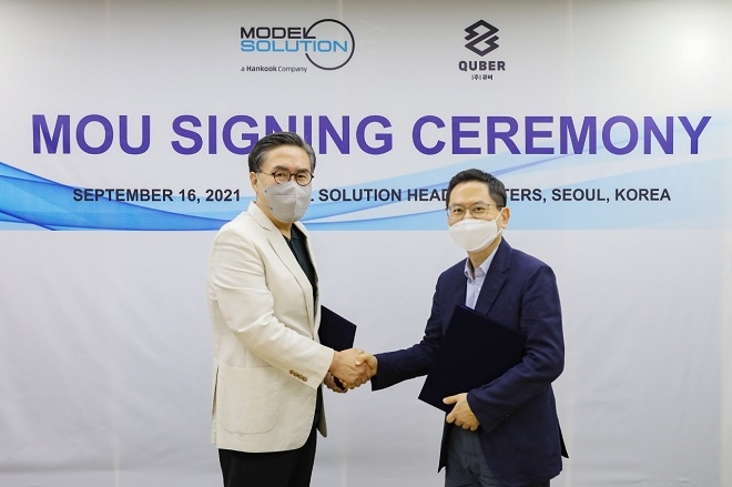 우병일 모델솔루션 대표이사(왼쪽)과 이장희 큐버 대표이사.