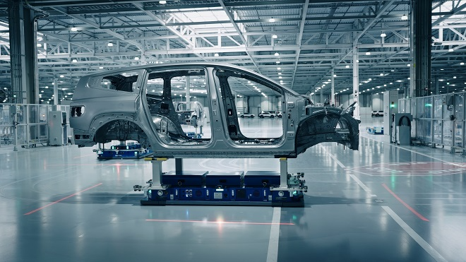 "로봇 노동자와 일하는 자동차 공장의 미래"