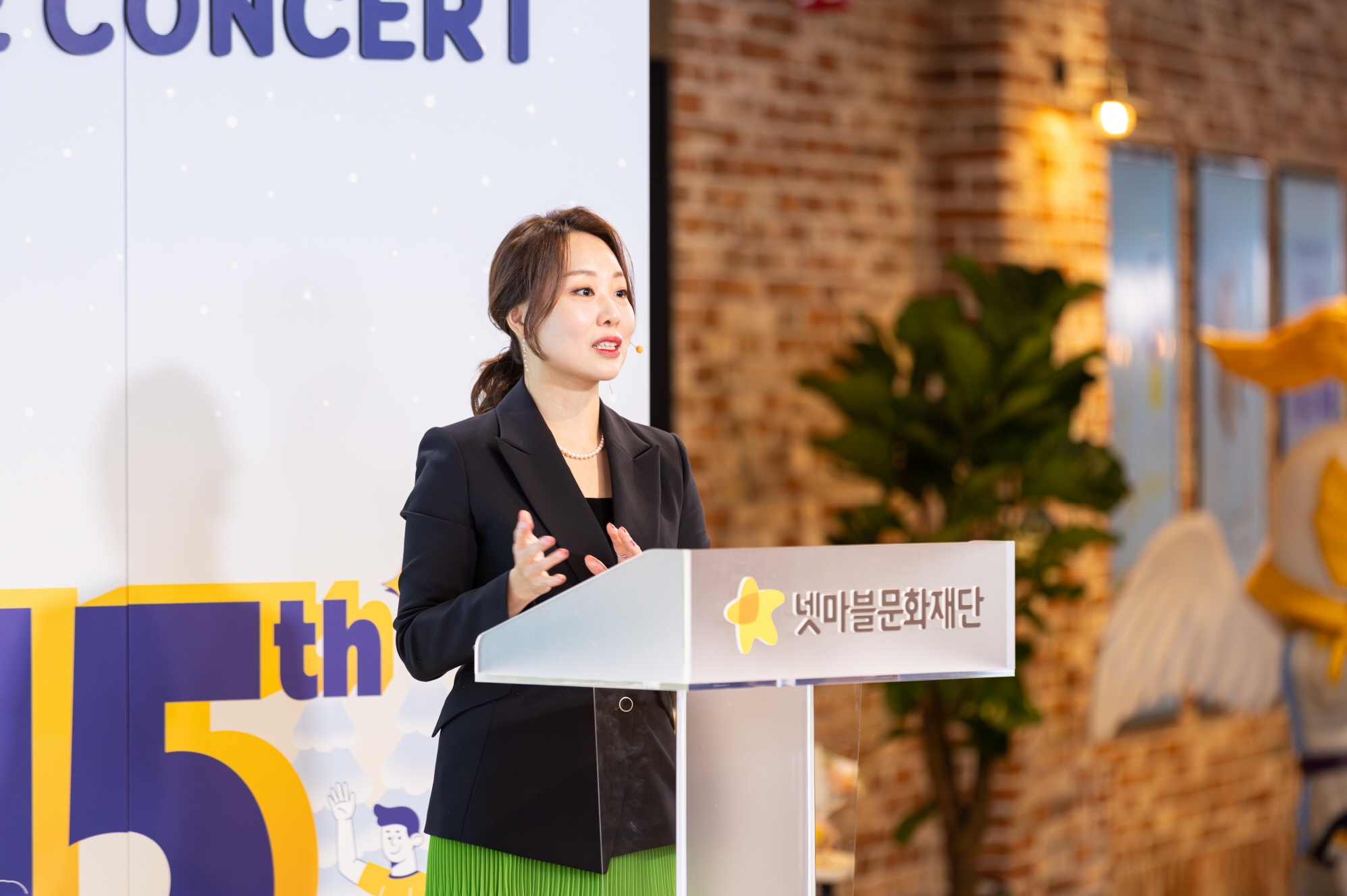 이나영 넷마블문화재단 사무국장이 지난 25일 열린 제19회 넷마블게임콘서트에서 강연하고 있다. / 사진제공=넷마블