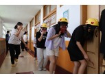 현대건설, 울산·울진 초교에 재난안전 CSR 전개…‘어린이용 경안전모’ 전달